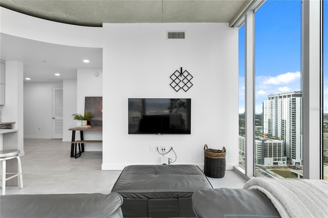 living room with a wall of windows