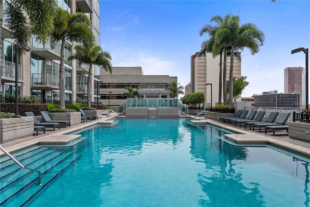 view of swimming pool with a patio