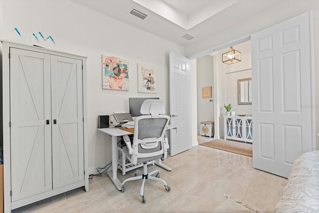 office space with a chandelier