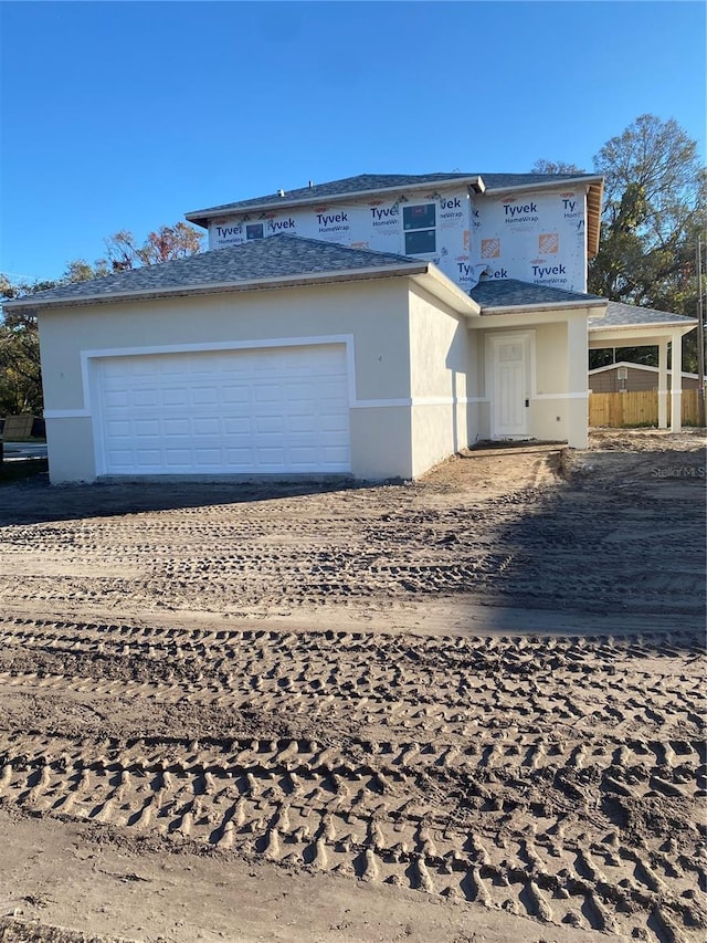 view of front of home featuring a garage