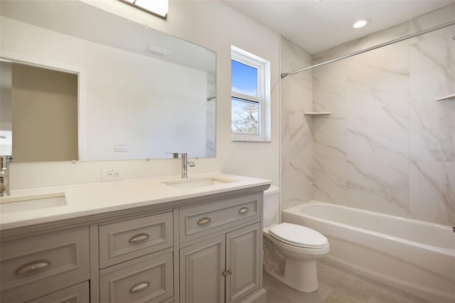 bathroom with shower / bath combination, a sink, toilet, and double vanity