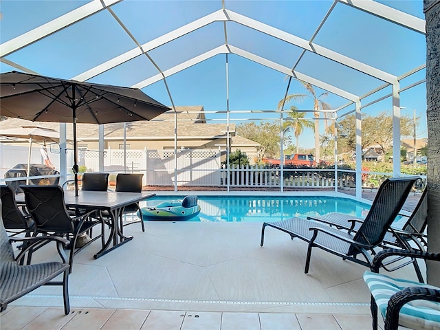 view of pool featuring a patio and a lanai