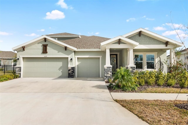 craftsman house with a garage