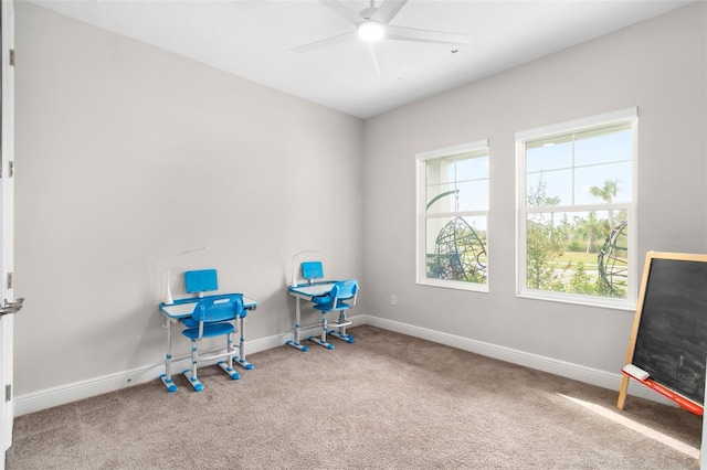 misc room featuring carpet and ceiling fan