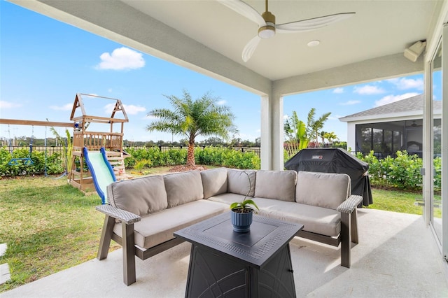 view of patio / terrace with a playground, outdoor lounge area, a sunroom, and ceiling fan