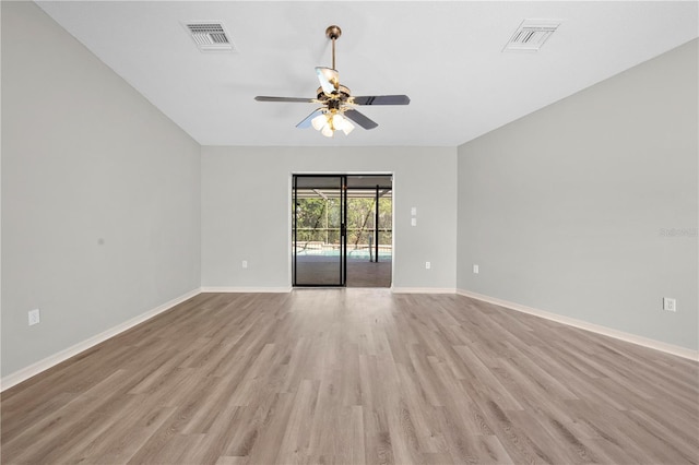 spare room with ceiling fan and light hardwood / wood-style floors