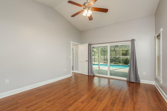 unfurnished room with ceiling fan, dark hardwood / wood-style floors, and high vaulted ceiling