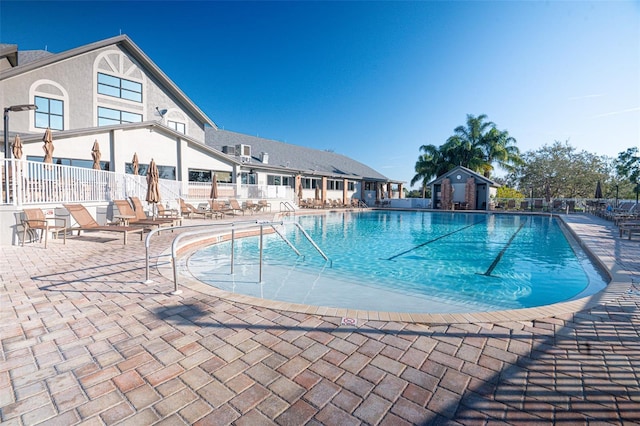 view of swimming pool featuring a patio