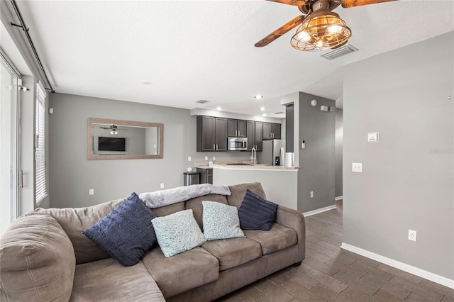 living room with dark hardwood / wood-style flooring