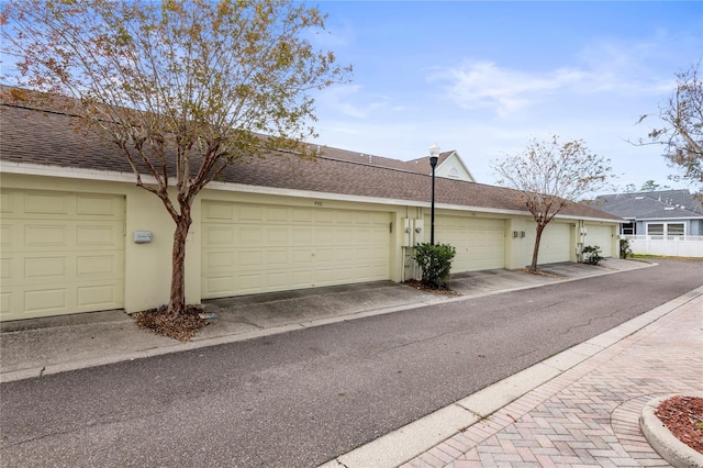 exterior space with a garage