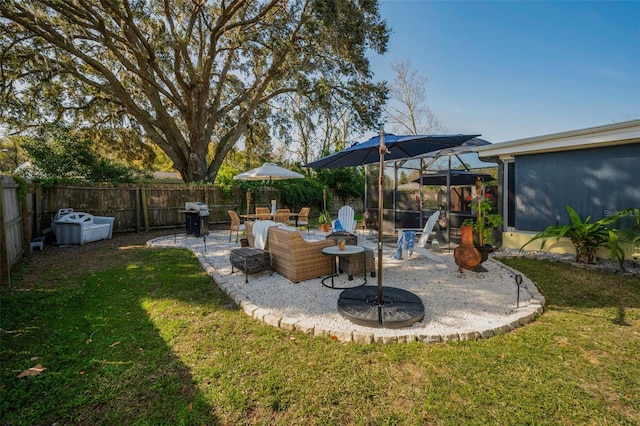 view of patio featuring a grill