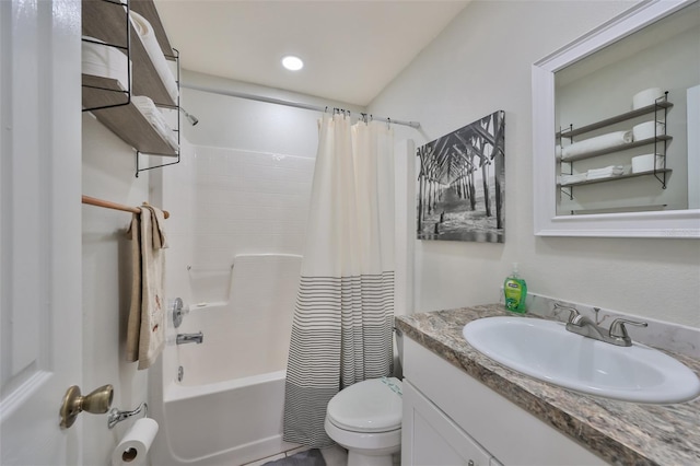 full bathroom with vanity, toilet, and shower / tub combo with curtain