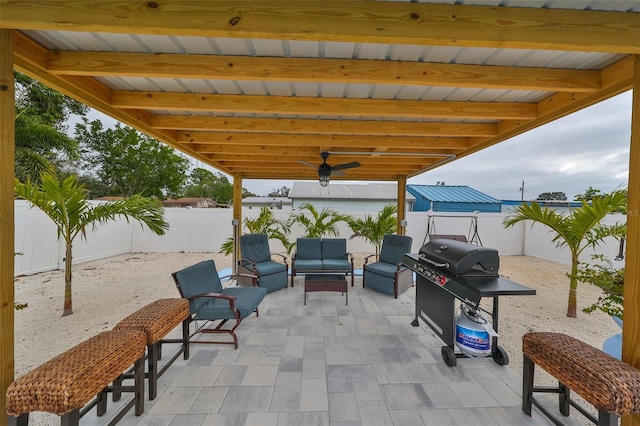 view of patio / terrace with ceiling fan, an outdoor hangout area, and grilling area