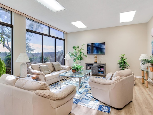 living room with light hardwood / wood-style floors