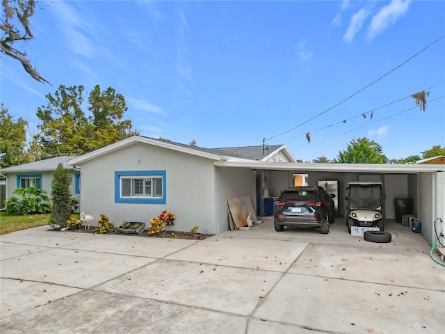 view of front of house with a carport