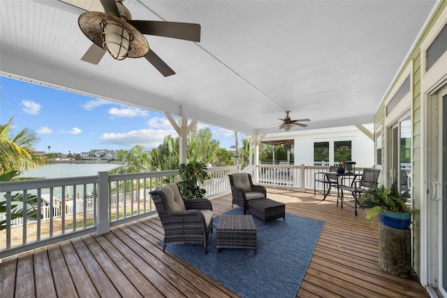 wooden deck with a water view