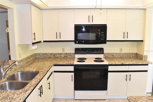 kitchen with light stone countertops, white cabinets, white range with electric stovetop, sink, and light tile patterned flooring