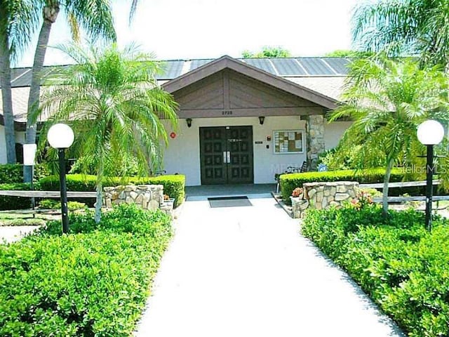 entrance to property with a porch