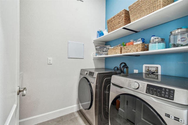 laundry room featuring independent washer and dryer