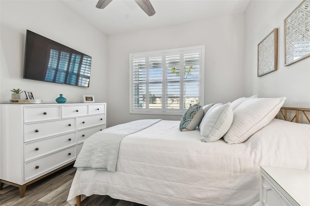 bedroom with ceiling fan and wood finished floors