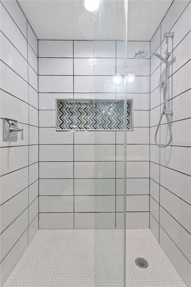 bathroom featuring walk in shower