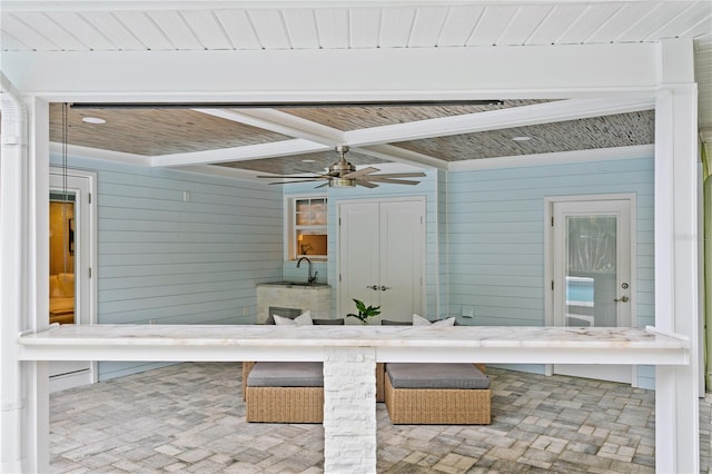 view of patio with ceiling fan