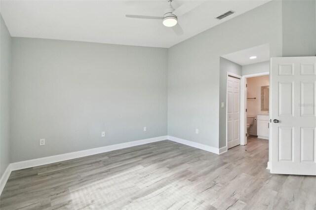 empty room featuring ceiling fan and light wood-type flooring