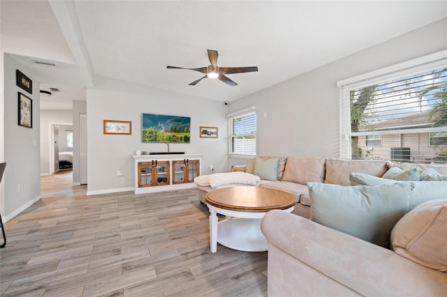 living room with ceiling fan