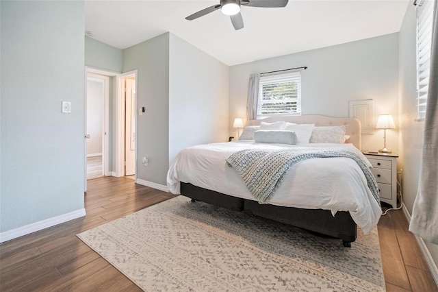 bedroom with hardwood / wood-style flooring and ceiling fan