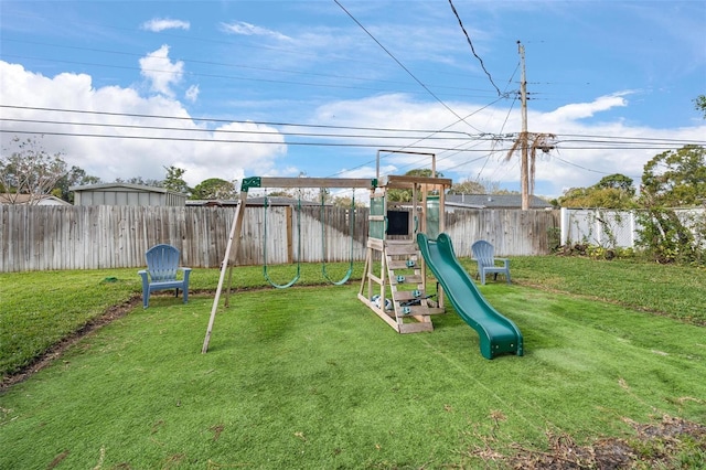 view of jungle gym with a lawn