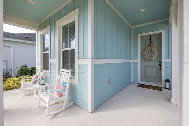 doorway to property with covered porch