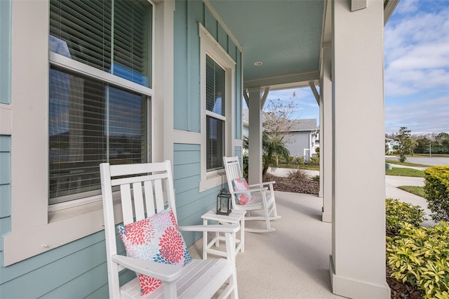 view of patio featuring a porch