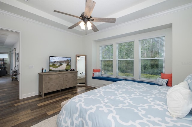 bedroom featuring ceiling fan, dark hardwood / wood-style floors, and ornamental molding