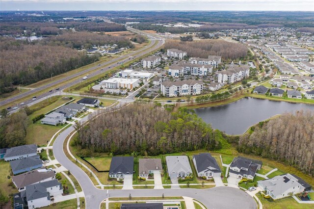 drone / aerial view with a water view