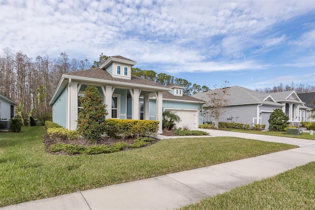 view of front of property with a porch, cooling unit, a garage, and a front lawn