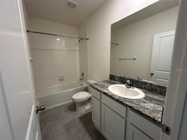 full bathroom featuring tile patterned floors, vanity, shower / bathtub combination, and toilet