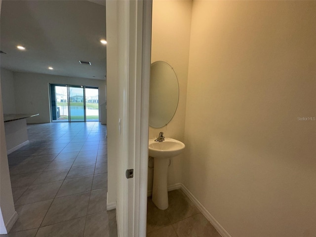 bathroom featuring tile patterned flooring