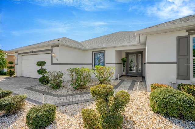 view of front of property featuring a garage