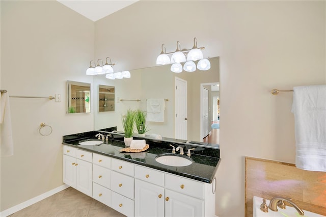 bathroom featuring tile patterned floors and vanity