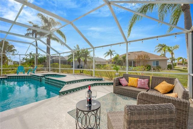 view of pool featuring an in ground hot tub, a patio, and glass enclosure