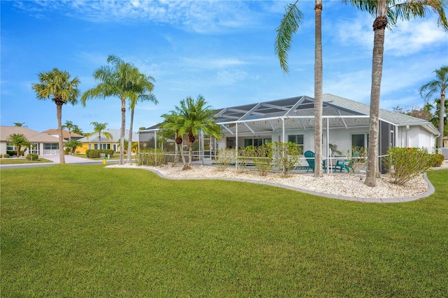 view of yard with a lanai