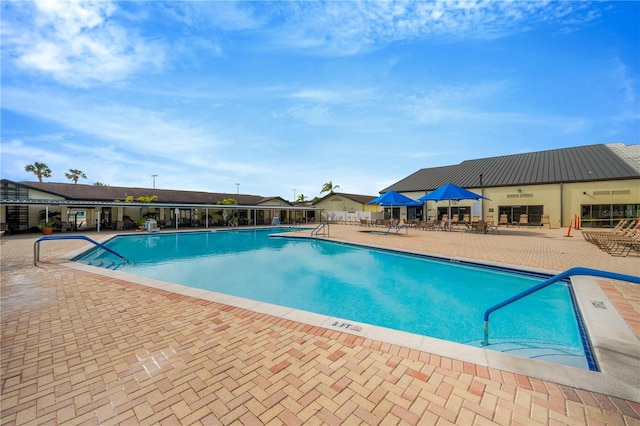 view of pool with a patio area