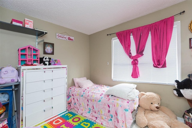 bedroom with a textured ceiling