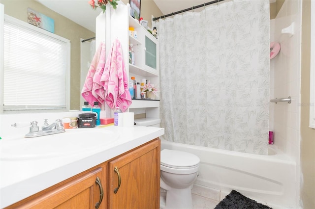 full bathroom featuring tile patterned flooring, vanity, toilet, and shower / bathtub combination with curtain