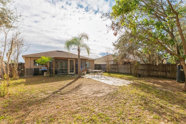 view of yard with a patio area and a sunroom