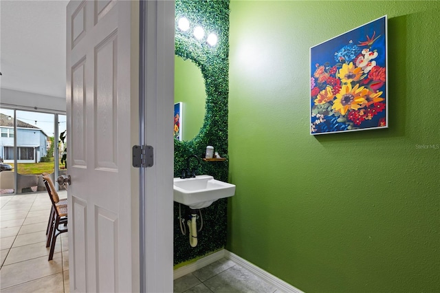 bathroom with sink and tile patterned floors