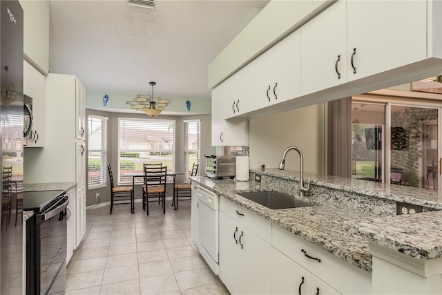 kitchen with white cabinetry, black / electric stove, dishwasher, and sink