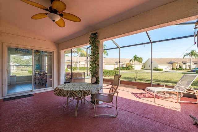 sunroom / solarium with vaulted ceiling and ceiling fan