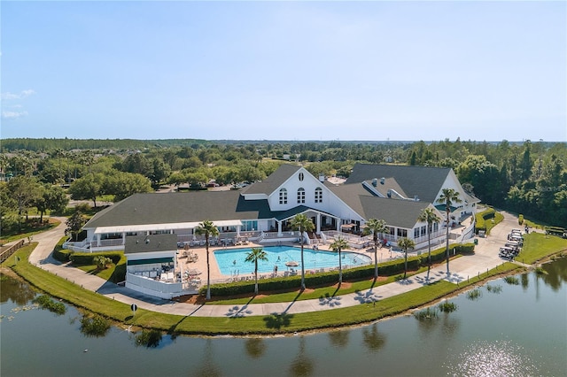 birds eye view of property featuring a water view