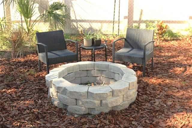 view of patio / terrace with an outdoor fire pit